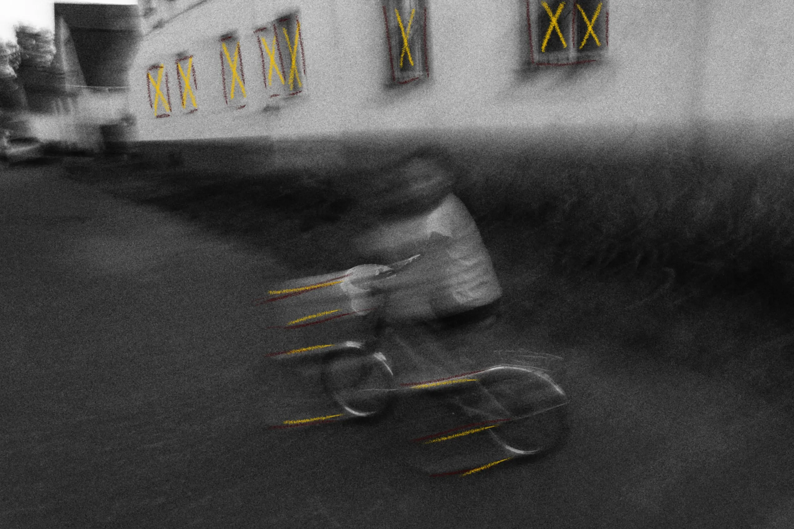 A cyclist blurred in motion