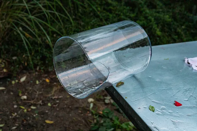 An overturned glass vase
