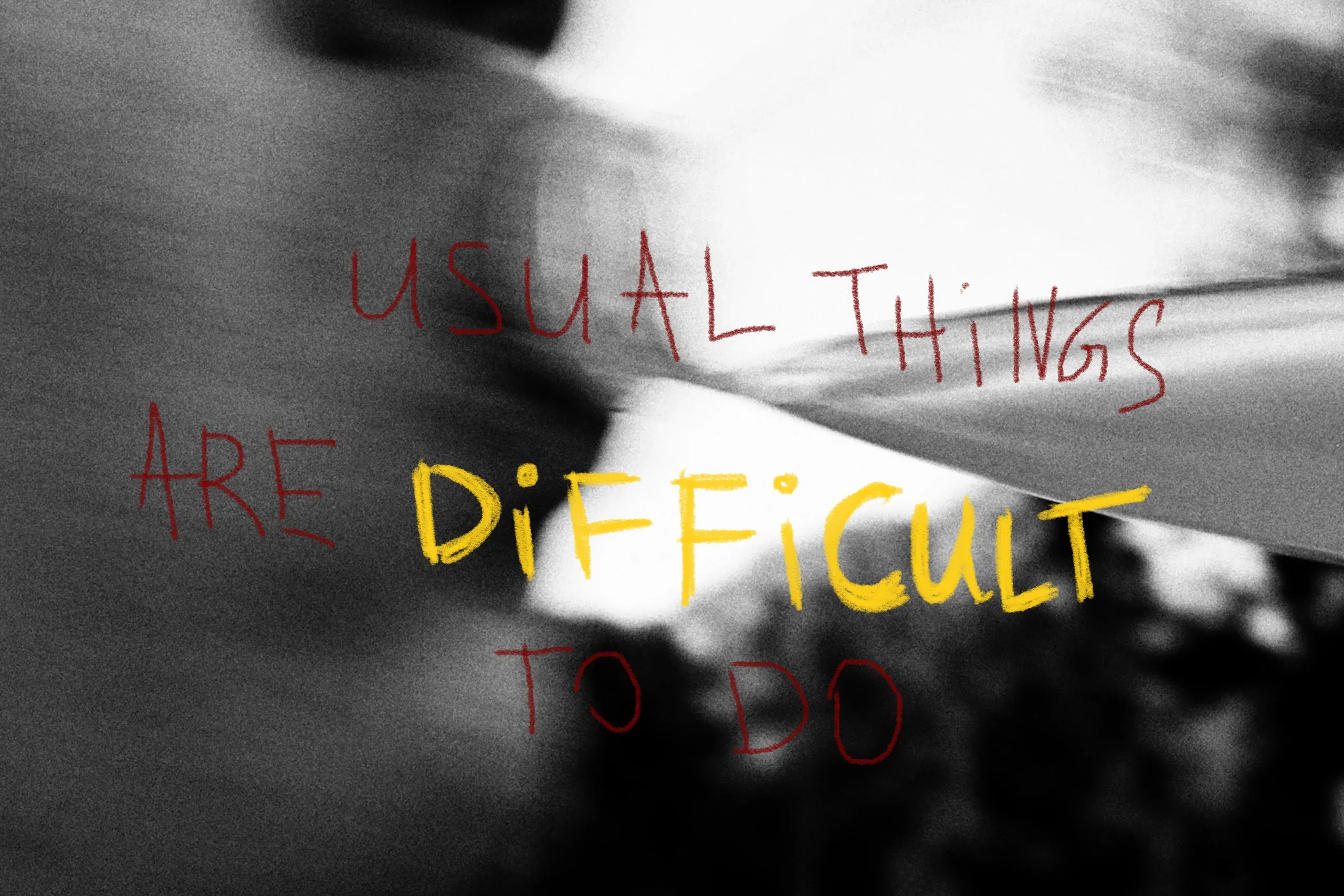 Usual things are difficult, written over a photograph